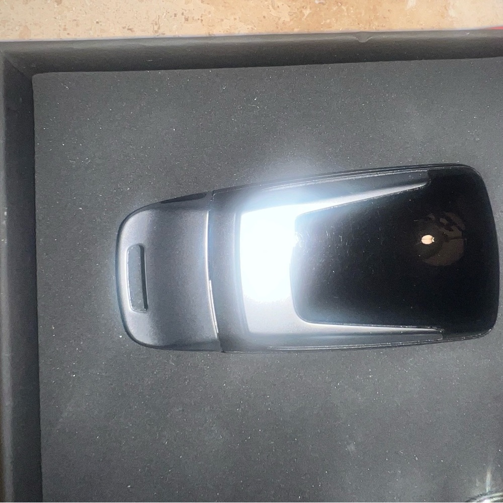 1 AUDI KEYFOB,3 KEY CHAINS, 1 Audi RED BOX, 1 Audi BOOKLET WALLET